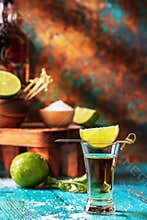 Shot of Reposada Tequila on Worn Aqua Table