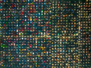 Colorful tents of Muslims congregation at night