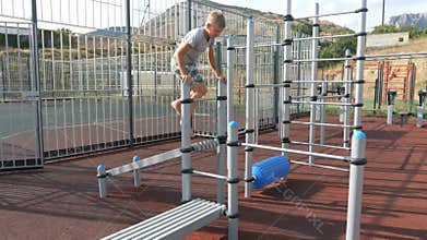 Children on the playground on the street in the yard. Live a healthy life. Be H3althy