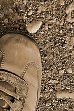 Hiking boot shoe hard arid dried soil