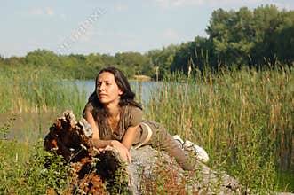 Woman on log