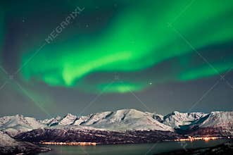 Northern lights over fjords in Norway