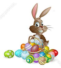 Easter bunny rabbit with Easter eggs basket