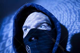 Hacker with binary background