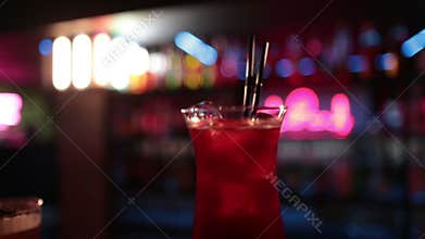 Ready-made drinks are on the bar ready to be consumed.