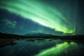 Northern lights above a lagoon in Iceland