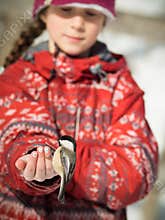 Girl feeding a bird