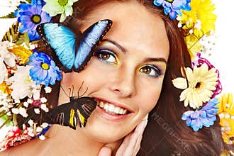 Woman with flower and butterfly.