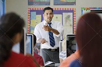 High School Teacher Teaching In Class