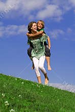 Happy piggyback family fun