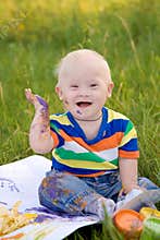 Little baby boy with Down syndrome