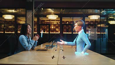 Video call of an asian woman with cartoon character boy uses hologram technology