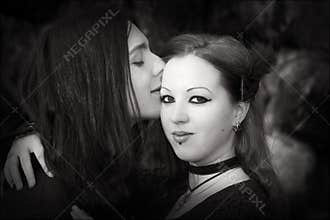 Gothic couple kissing