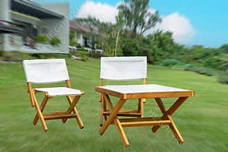 Camping wood chair on the garden blurry background