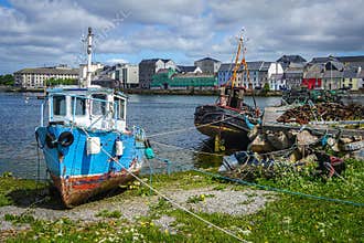 Abandoned boats along a coastline in Ireland