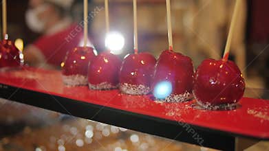 Hand dipped caramel covered apples decorated with chocolate at the hotel.