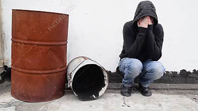 Man with problems alone on the street.