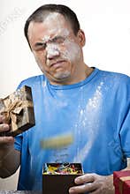 Gift box spouting powder prank