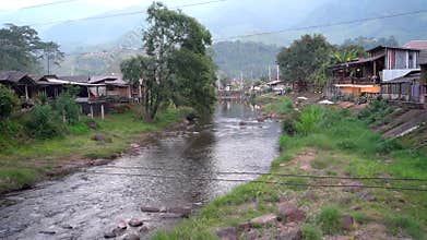 Clear Stream Flowing Over Rocks Nature's Serenity Mang River in Nan , Thailand.