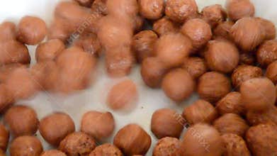 Choco balls cereal pouring into white background