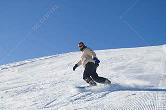 Snowboarding in the mountain stock photo