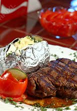 Steak and baked potatoe