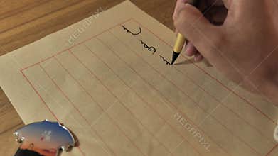 close shot of Chinese manchu language Calligraphy writing