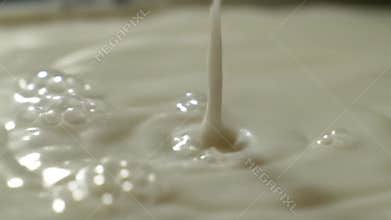 Milk Drop Ripple: Creamy White Liquid, Close-Up Macro, Slow Motion, Abstract Texture