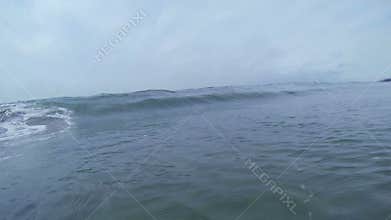 Ocean Wave Breaking on the Beach in California