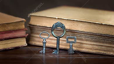 Vintage keys and books, escape room game background
