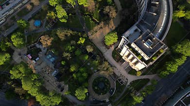 Aerial of the Palais de Chaillot with trees and street view in Trocadero Square of Paris, France