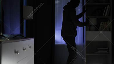 male intruder entered room at night in search of jewelry and money and rummaged through chest of drawers