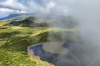 Lake Lagoa da Caiadoand and electric windmills on the island of Pico in the Azores