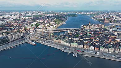 Aerial view of Stockholm old town. Flying over the bay. Amazing drone footage of Stockholm yacht canal