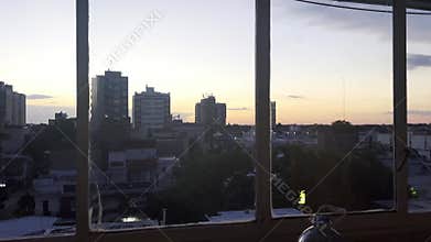 City skyline at sunset, beautiful view of urban architecture. Evening travel and night scenes with