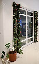 Chrismast decoration gate details with green leafy plants
