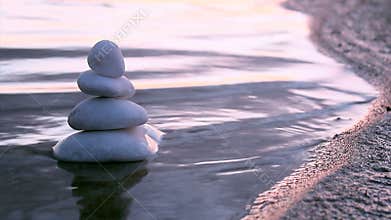 Stones in Zen style and sea waves