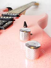 Pink electric guitar