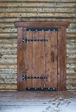 Wooden door of traditional beam country house