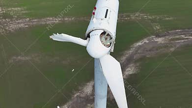 Close-up of a destroyed wind turbine generator. Strong winds and high speeds break the propellers