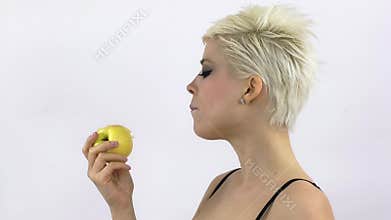Woman eating apple