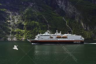 A ship in a fjord.