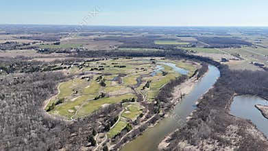 Drone view of Kitchener, Ontario displaying a patchwork of farmland threaded with rivers and lakes