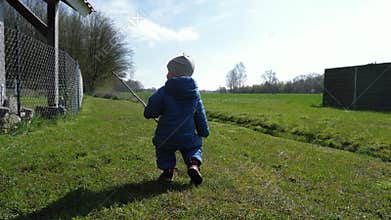 Toddler Exploring Yard