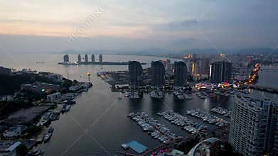 Aerial top view of luxury yachts moored neatly in harbor port