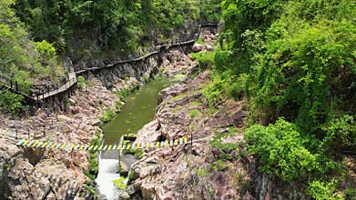 Top view of the river in the canyon in the center of Hainan Island, China. The wildlife of the island. national park in