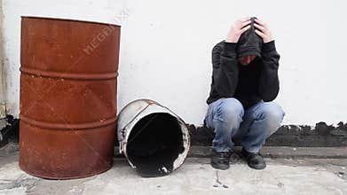 Man with problems alone on the street.
