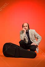 Guitarist with case