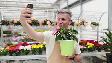 Florist Man Taking a Plant Selfie