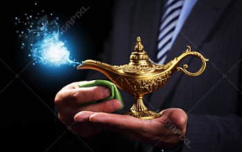 Rubbing magic Aladdins genie lamp